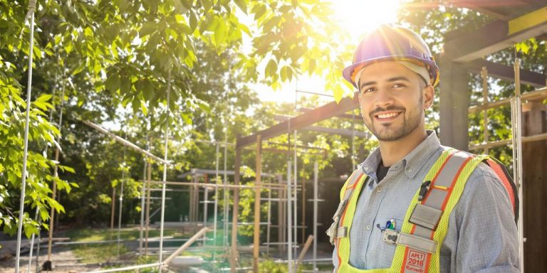 Contractor working outdoors during summer.